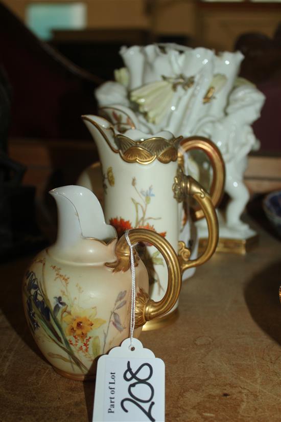 Moore figural jardiniere and three Royal Worcester blush ivory jugs (a.f)